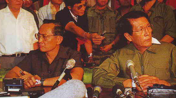  - former-defence-minister-juan-ponce-enrile-right-and-armed-forces-vice-chief-of-staff-fidel-ramos-announciing-their-widrawal-of-support-for-marcos